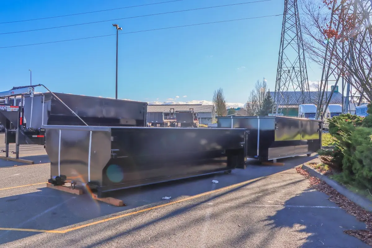 Roll-off dumpster ready for waste disposal at job site for Concrete Dumpster Rental in Bradfordville